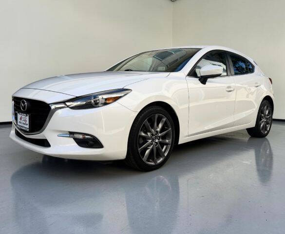 mazda mazda3 2018 3MZBN1M34JM264001 image mazda mazda3 2018 3MZBN1M34JM264001 image