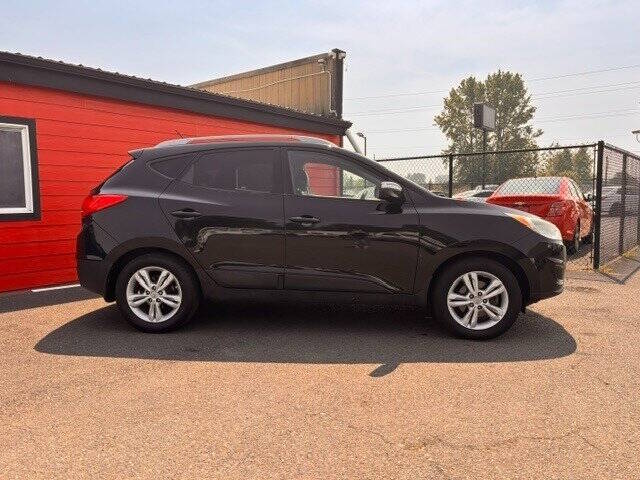 hyundai tucson 2012 KM8JUCAC8CU541079 image hyundai tucson 2012 KM8JUCAC8CU541079 image
