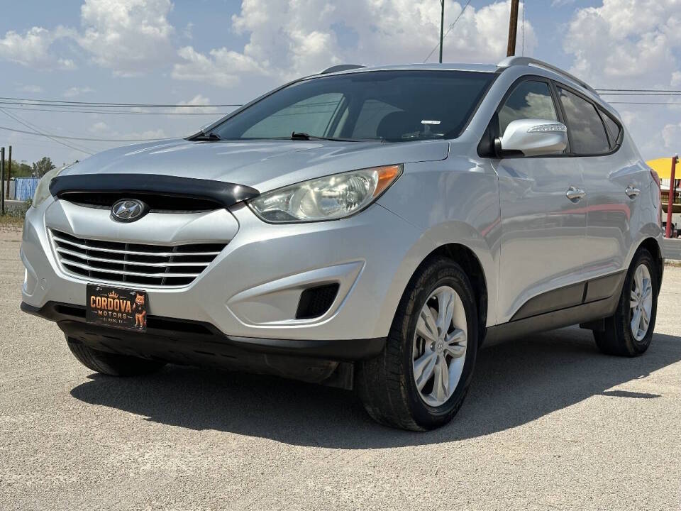 hyundai tucson 2012 KM8JUCAC6CU501390 image hyundai tucson 2012 KM8JUCAC6CU501390 image