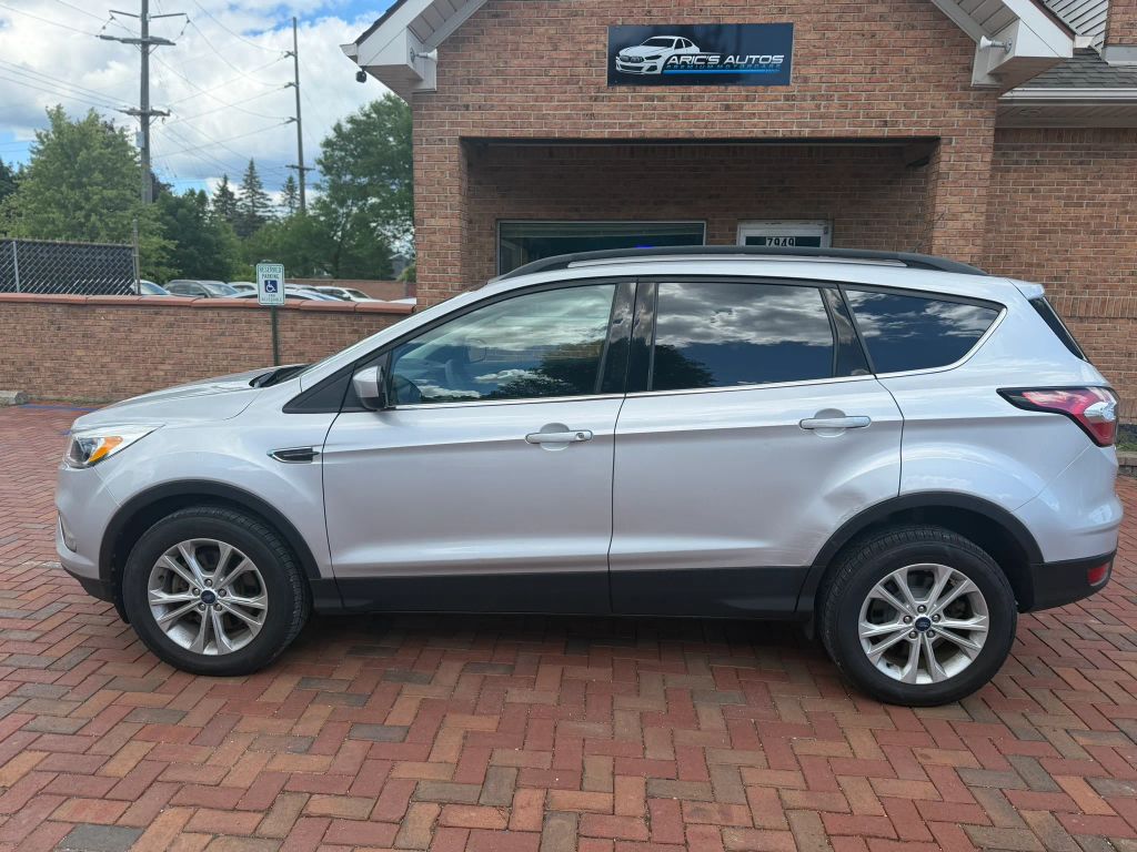 ford escape 2018 1FMCU9GD2JUD57409 image ford escape 2018 1FMCU9GD2JUD57409 image
