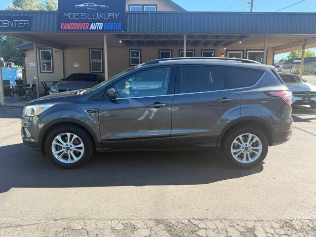 ford escape 2018 1FMCU9GD5JUA11077 image ford escape 2018 1FMCU9GD5JUA11077 image