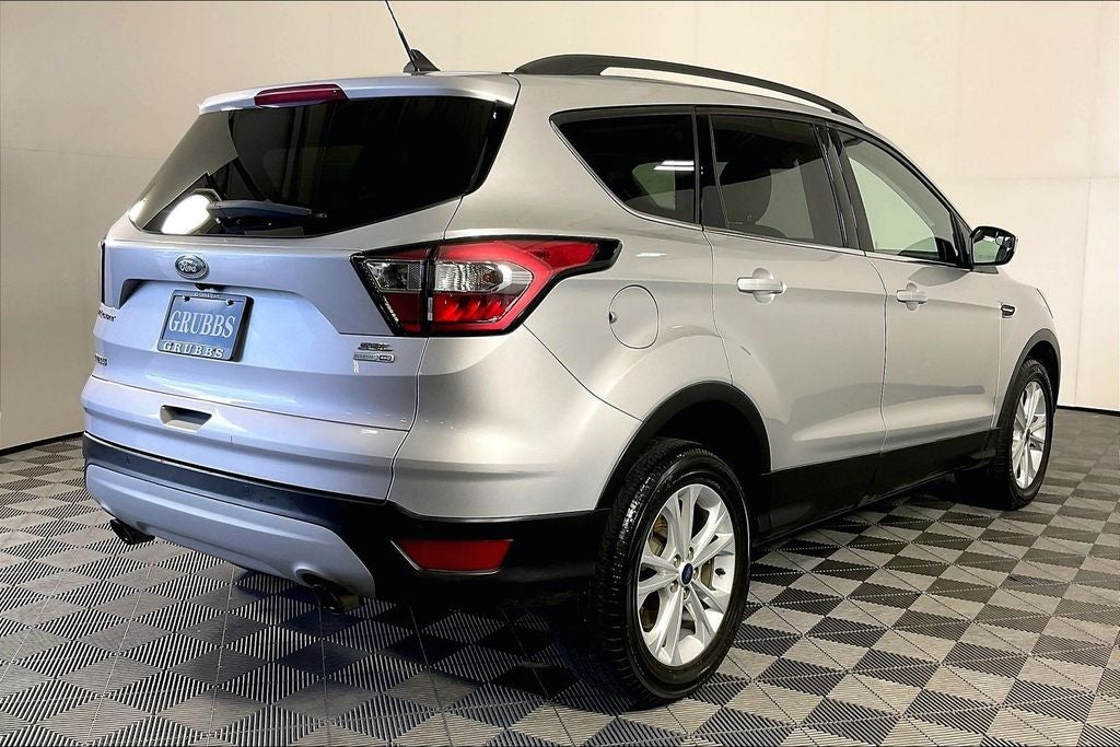 ford escape 2018 1FMCU9HD0JUD00351 image ford escape 2018 1FMCU9HD0JUD00351 image