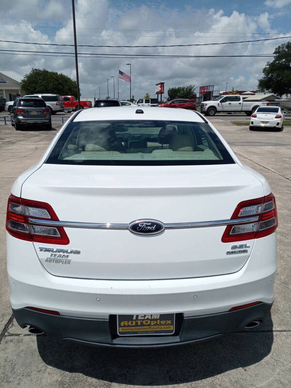 ford taurus 2013 1FAHP2E82DG135704 image ford taurus 2013 1FAHP2E82DG135704 image