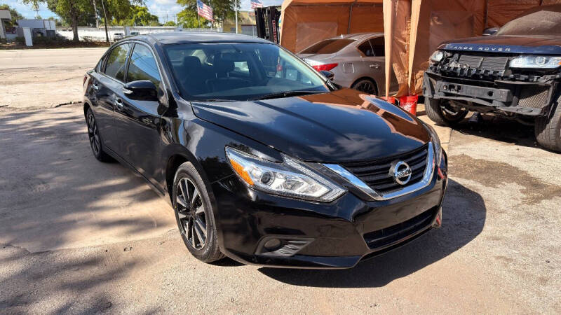 nissan altima 2018 1N4AL3APXJC125635 image nissan altima 2018 1N4AL3APXJC125635 image