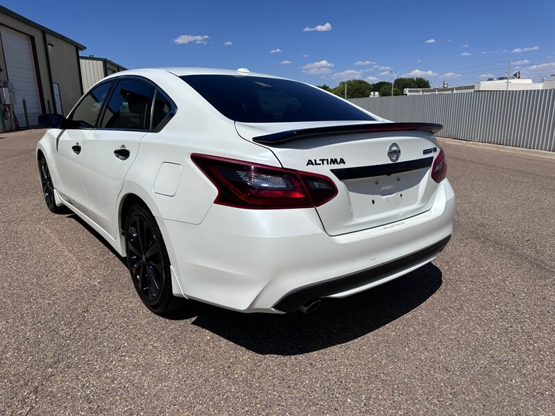 nissan altima 2018 1N4AL3AP3JC239461 image nissan altima 2018 1N4AL3AP3JC239461 image