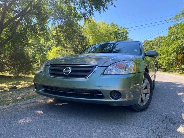 nissan altima 2003 1N4AL11D13C136911 image nissan altima 2003 1N4AL11D13C136911 image