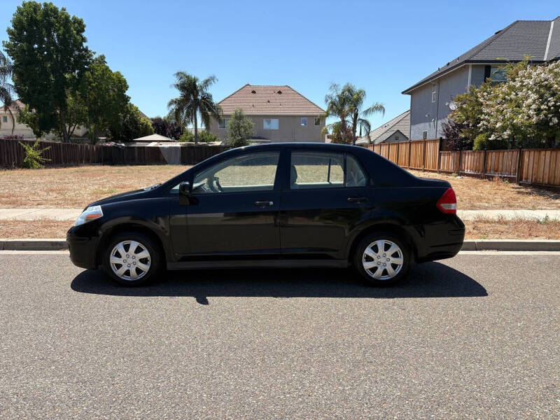 nissan versa 2009 3N1BC11E19L490600 image nissan versa 2009 3N1BC11E19L490600 image