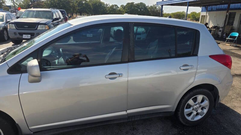 nissan versa 2009 3N1BC13E69L384169 image nissan versa 2009 3N1BC13E69L384169 image