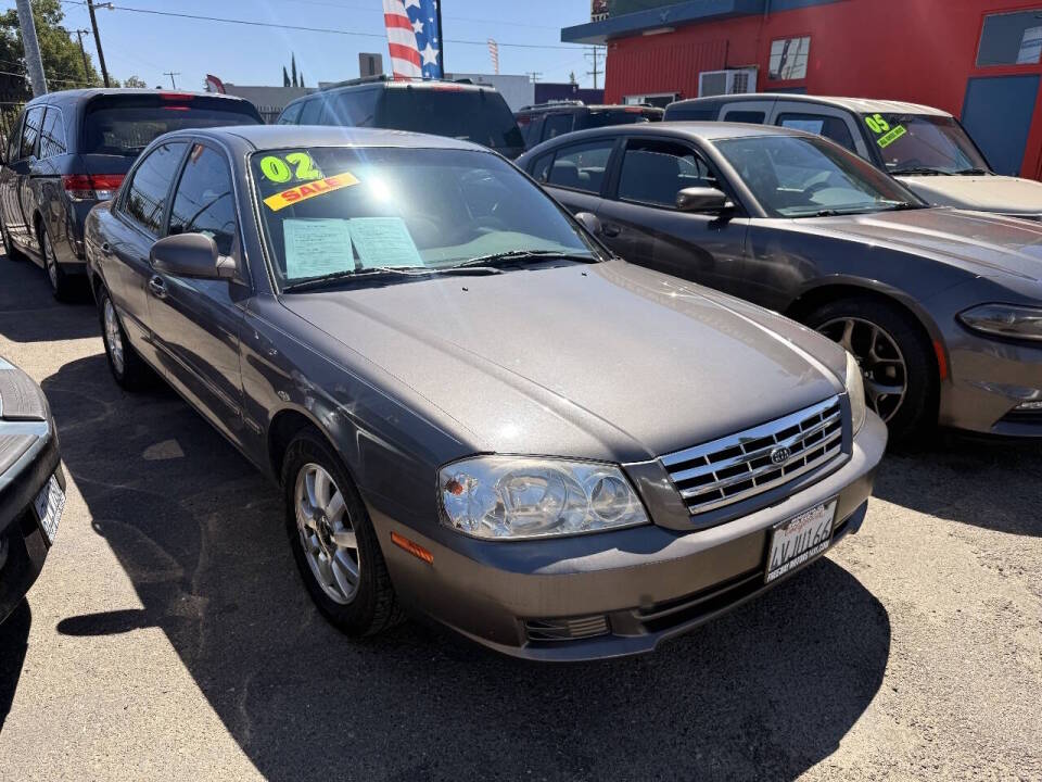 kia optima 2002 KNAGD128225141439 image kia optima 2002 KNAGD128225141439 image