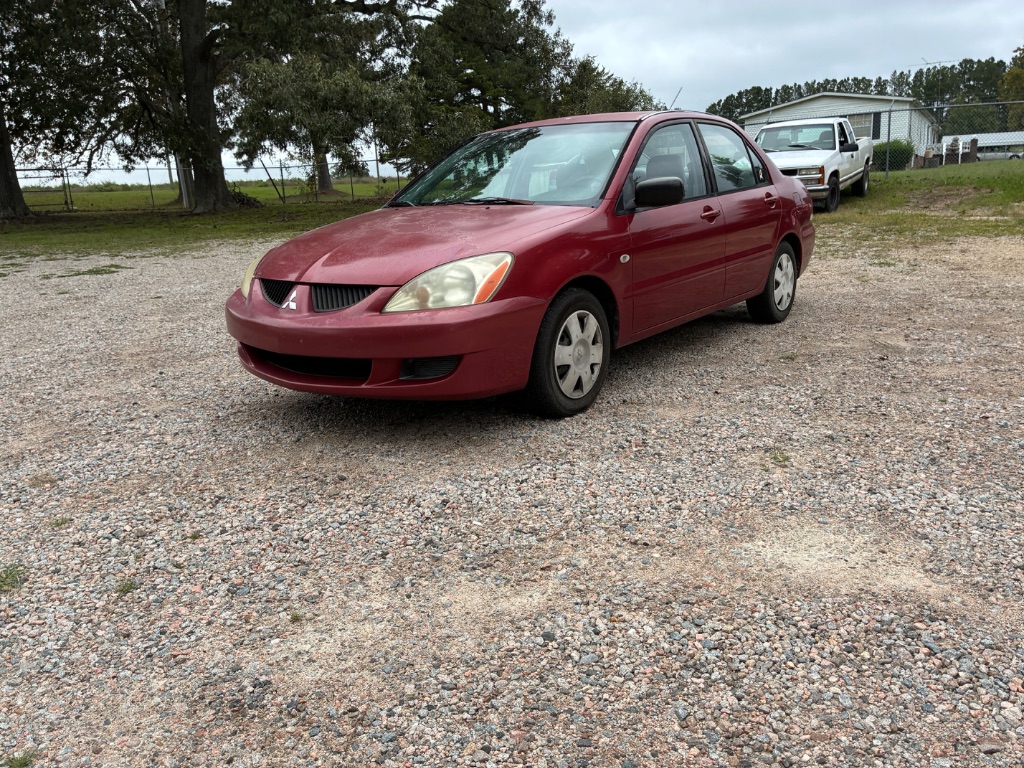 mitsubishi lancer 2004 JA3AJ26E34U034379 image mitsubishi lancer 2004 JA3AJ26E34U034379 image