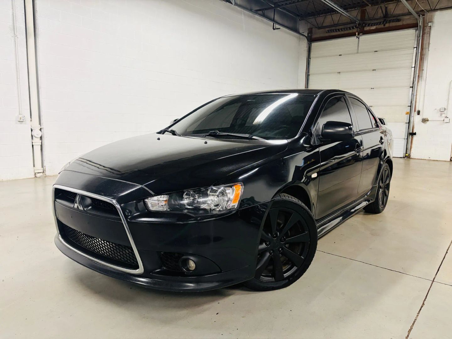 Mitsubishi Lancer 2013 JA32U8FW1DU012145 image Mitsubishi Lancer 2013 JA32U8FW1DU012145 image