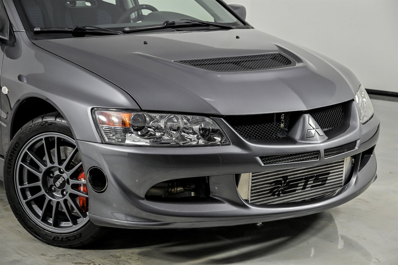 mitsubishi lancer 2005 JA3AH86D45U012088 image mitsubishi lancer 2005 JA3AH86D45U012088 image