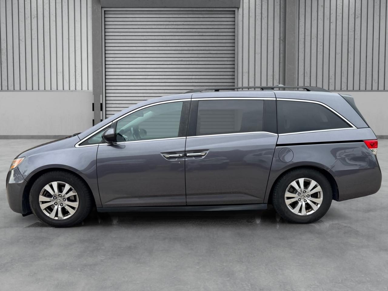 honda odyssey 2015 5FNRL5H61FB054311 image honda odyssey 2015 5FNRL5H61FB054311 image
