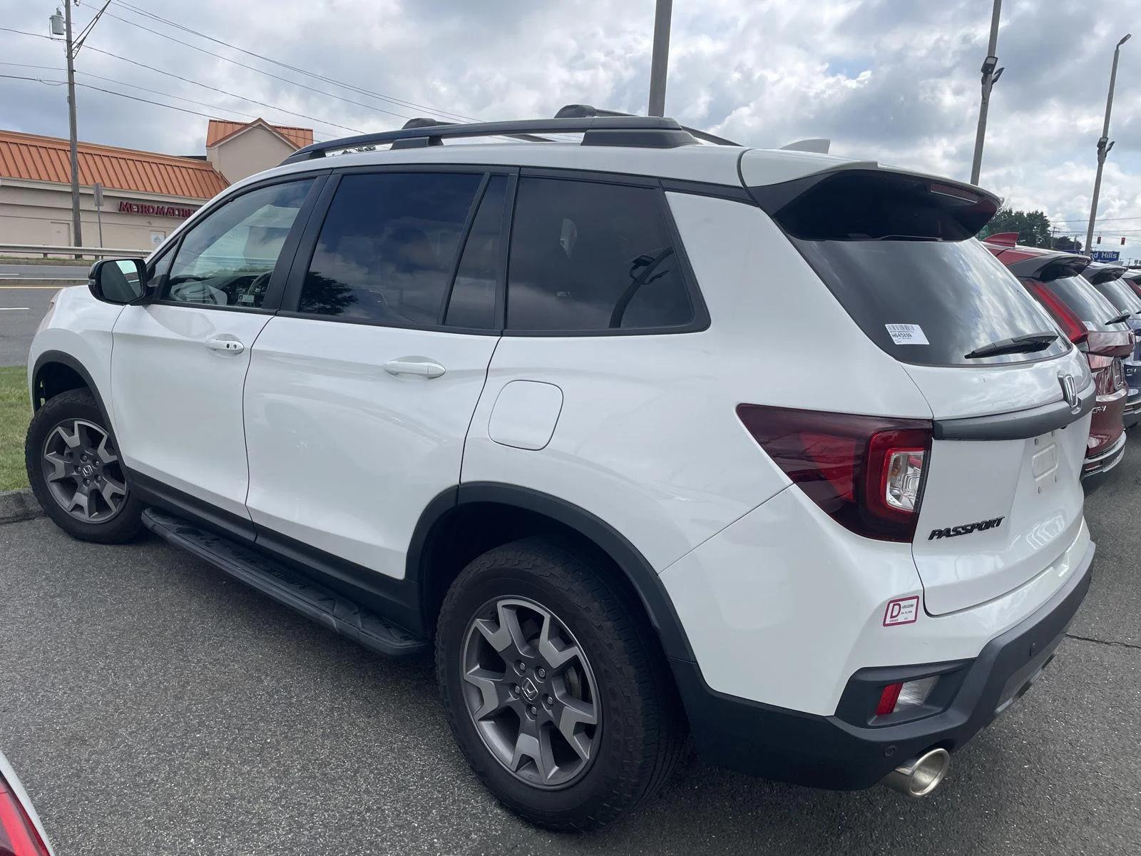 honda passport 2023 5FNYF8H66PB025733 image honda passport 2023 5FNYF8H66PB025733 image