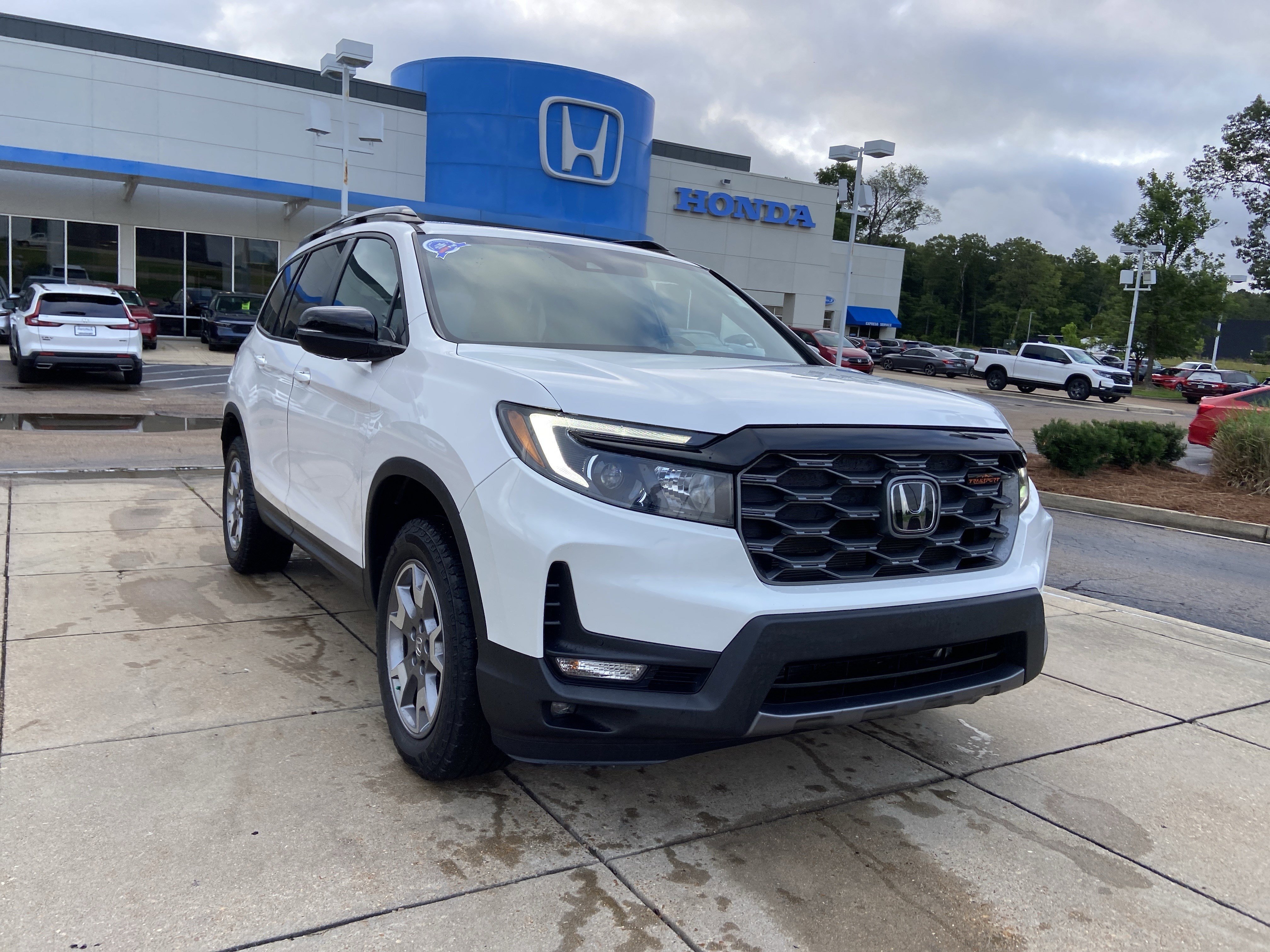 honda passport 2023 5FNYF8H68PB028553 image honda passport 2023 5FNYF8H68PB028553 image