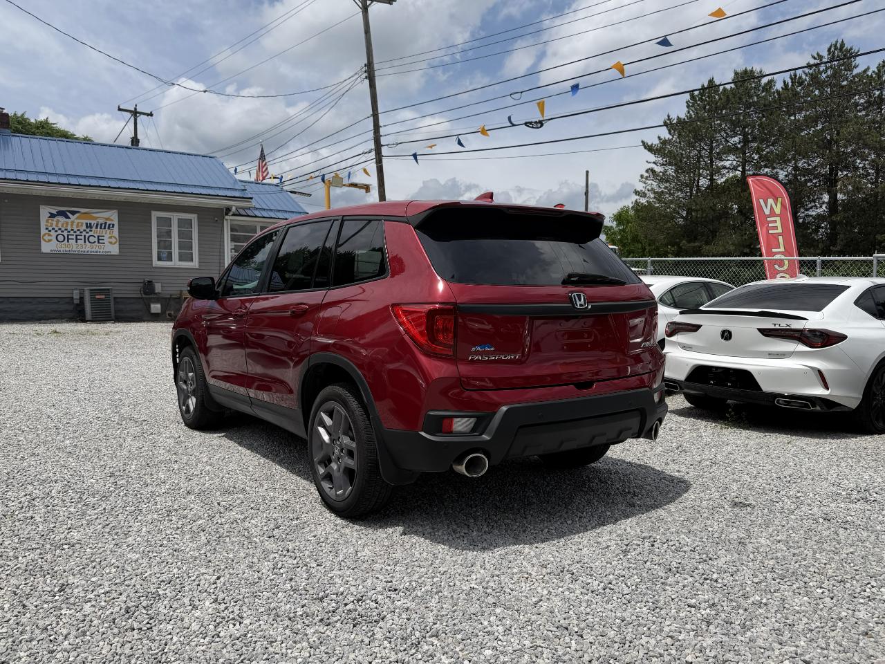 honda passport 2023 5FNYF8H56PB011905 image honda passport 2023 5FNYF8H56PB011905 image