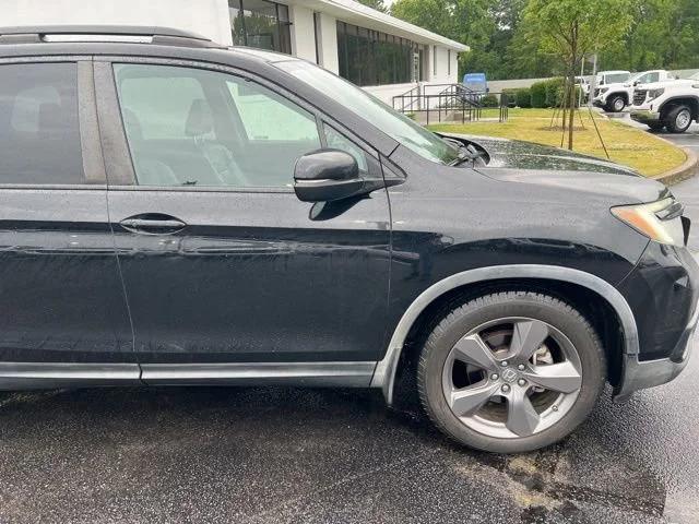 honda passport 2020 5FNYF7H95LB000711 image honda passport 2020 5FNYF7H95LB000711 image