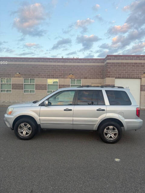 honda pilot 2004 2HKYF18474H603695 image honda pilot 2004 2HKYF18474H603695 image