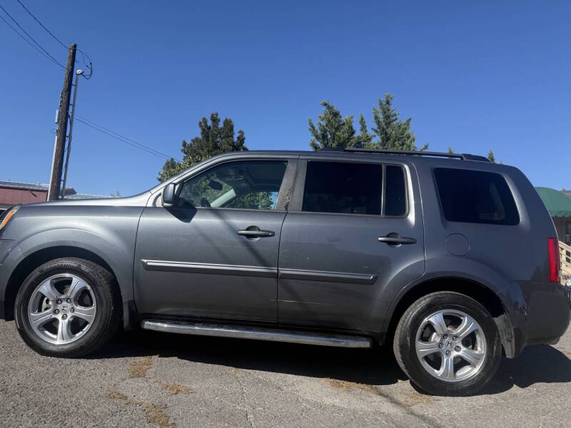 honda pilot 2013 5FNYF4H74DB052622 image honda pilot 2013 5FNYF4H74DB052622 image