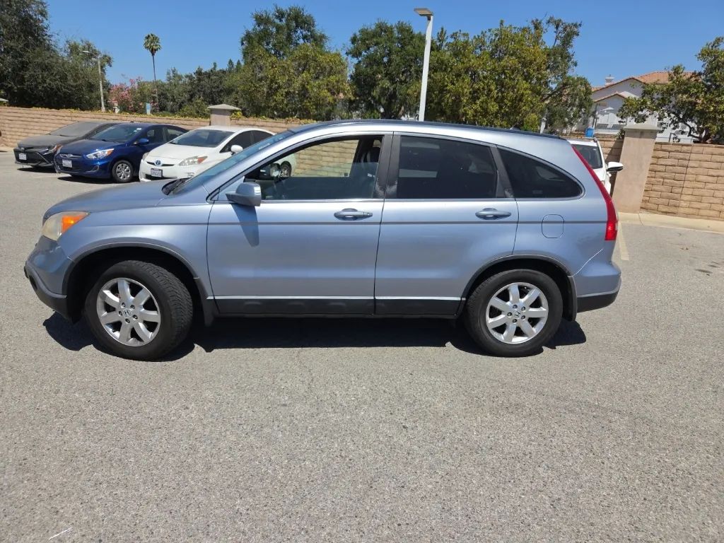 honda cr-v 2009 JHLRE38769C011658 image honda cr-v 2009 JHLRE38769C011658 image