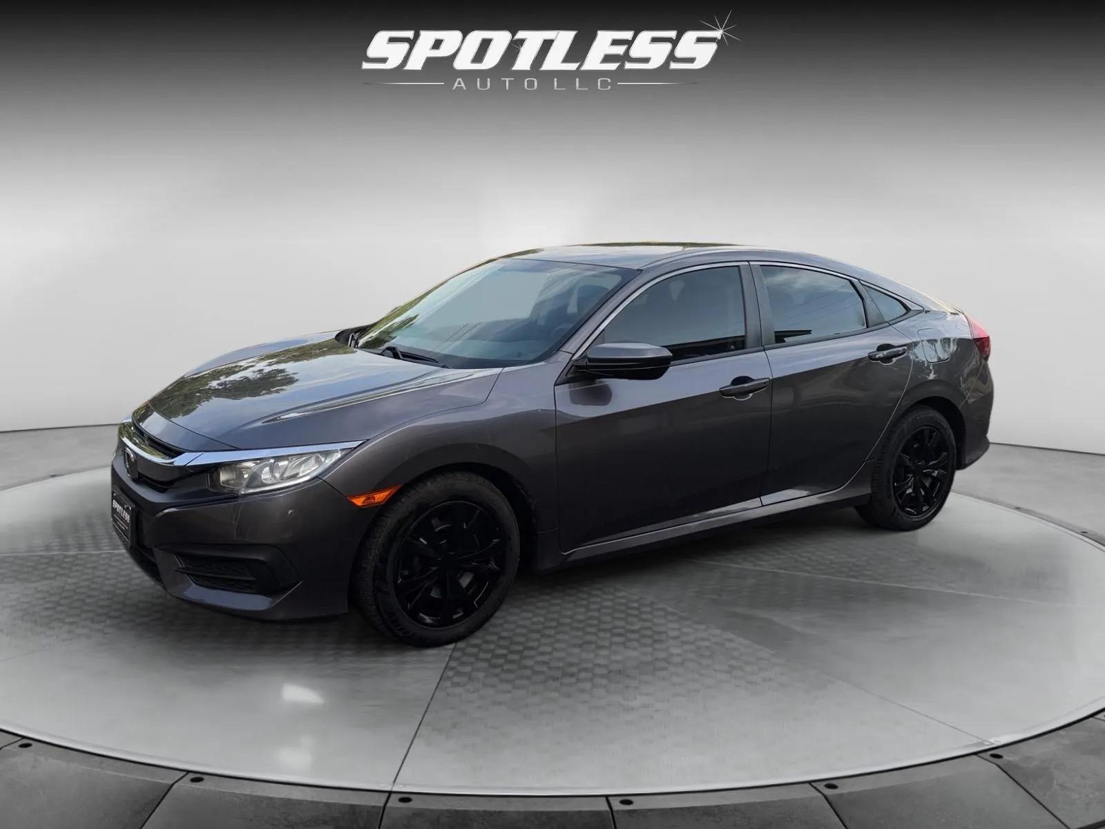 honda civic 2018 19XFC2E52JE000219 image honda civic 2018 19XFC2E52JE000219 image