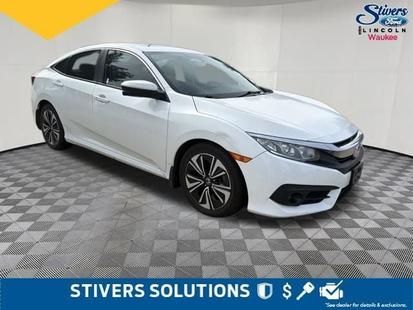 honda civic 2018 19XFC1F31JE002938 image honda civic 2018 19XFC1F31JE002938 image
