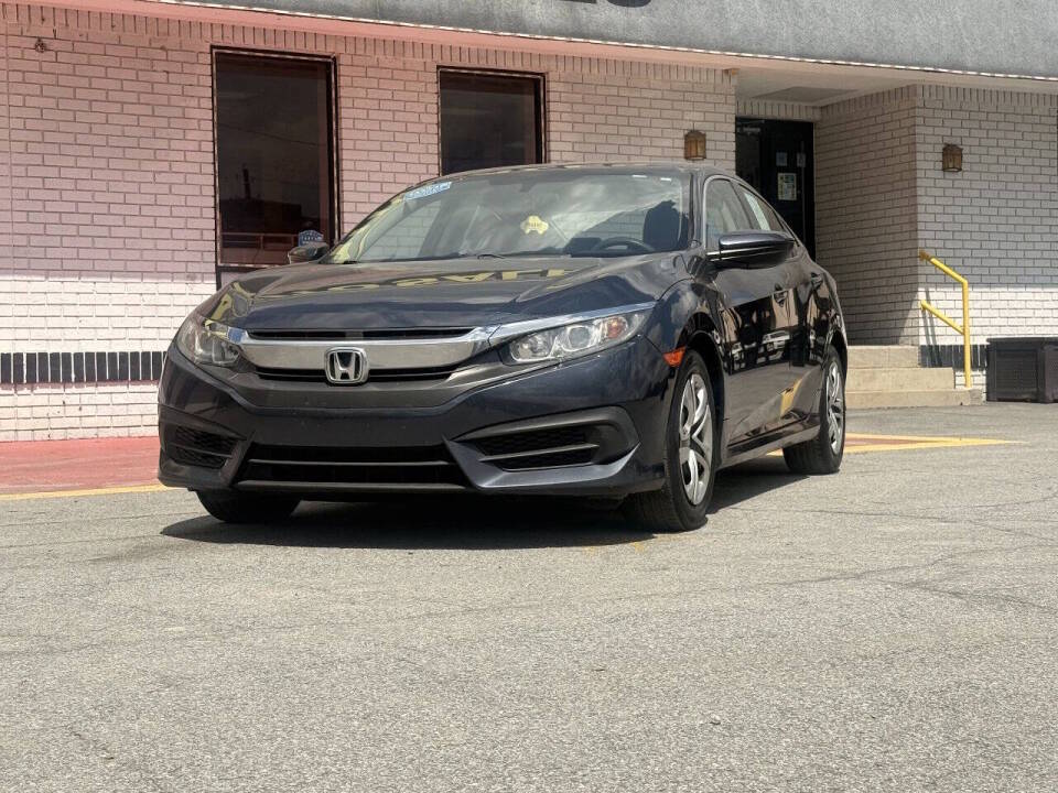honda civic 2018 19XFC2E57JE005514 image honda civic 2018 19XFC2E57JE005514 image