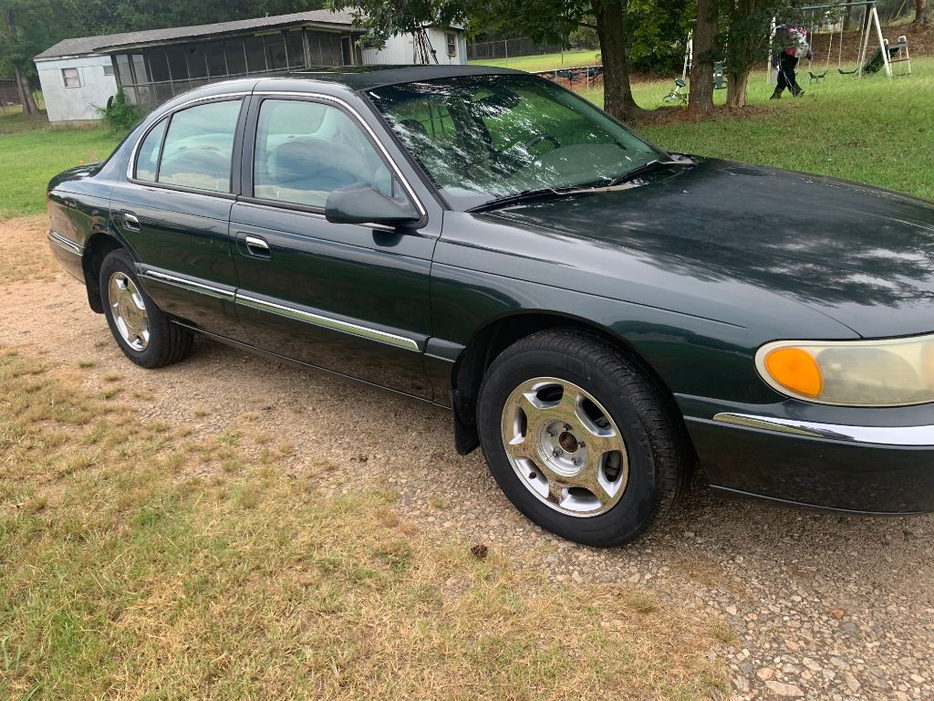 lincoln continental 2002 1LNHM97V12Y655605 image lincoln continental 2002 1LNHM97V12Y655605 image