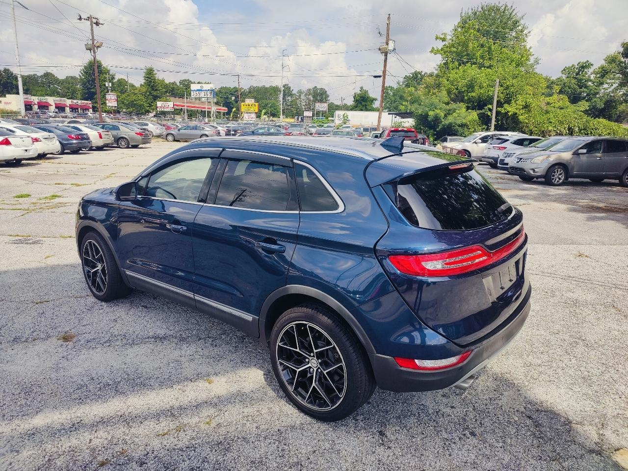 lincoln mkc 2015 5LMTJ2AH4FUJ31551 image lincoln mkc 2015 5LMTJ2AH4FUJ31551 image