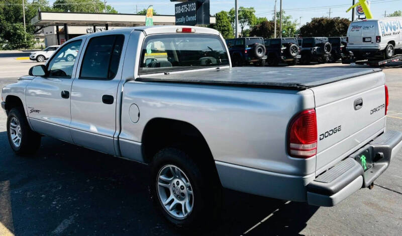 dodge dakota 2004 1D7HG38N64S507985 image dodge dakota 2004 1D7HG38N64S507985 image