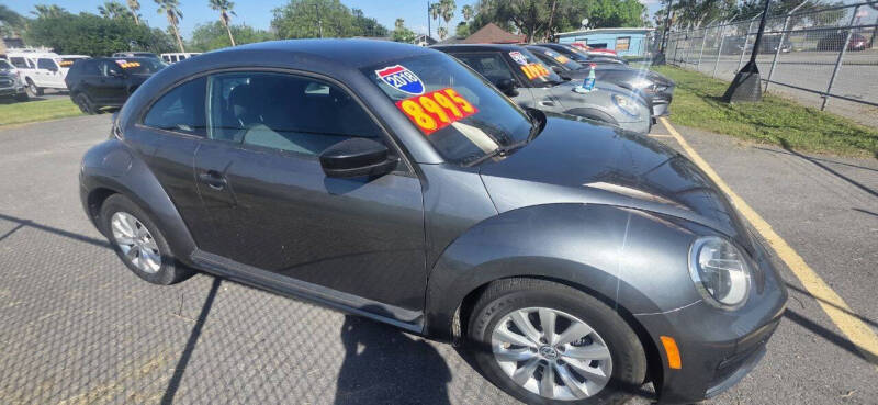 volkswagen beetle 2018 3VWFD7AT7JM707429 image volkswagen beetle 2018 3VWFD7AT7JM707429 image