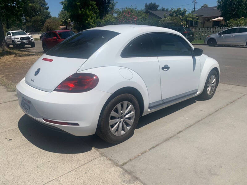 volkswagen beetle 2017 3VWF17AT2HM627474 image volkswagen beetle 2017 3VWF17AT2HM627474 image