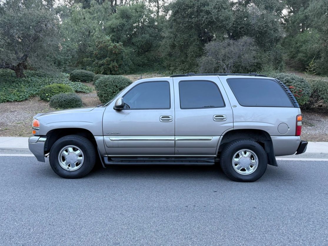 gmc yukon 2003 1GKEC13T43J319834 image gmc yukon 2003 1GKEC13T43J319834 image