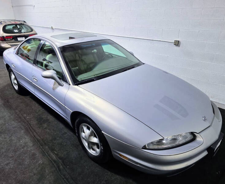 oldsmobile aurora 1997 1G3GR62C1V4102065 image oldsmobile aurora 1997 1G3GR62C1V4102065 image