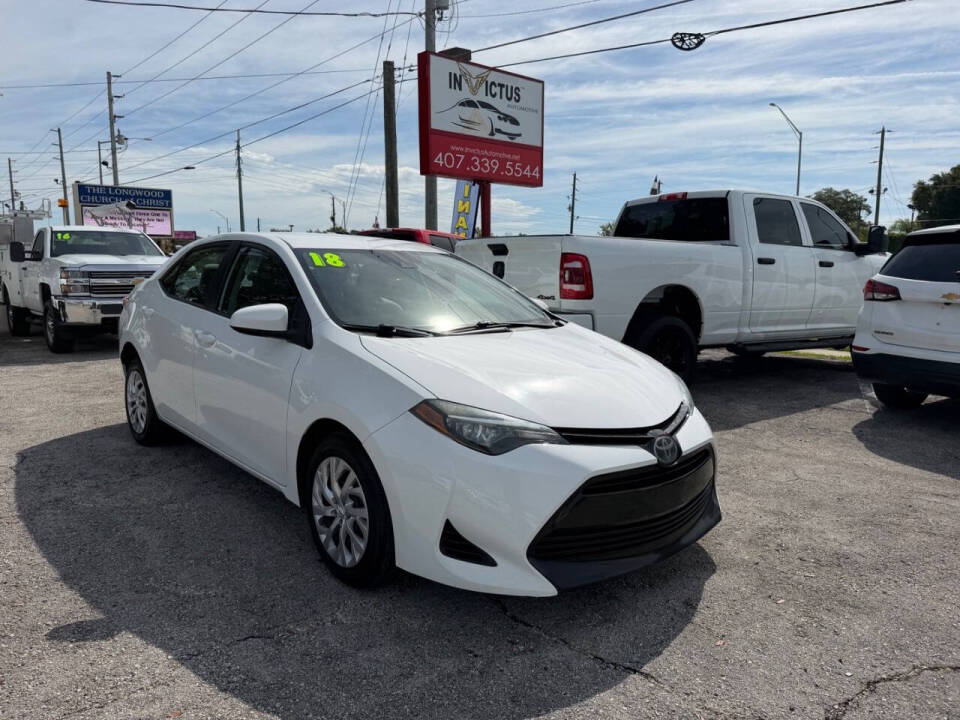 toyota corolla 2018 5YFBURHE0JP774886 image