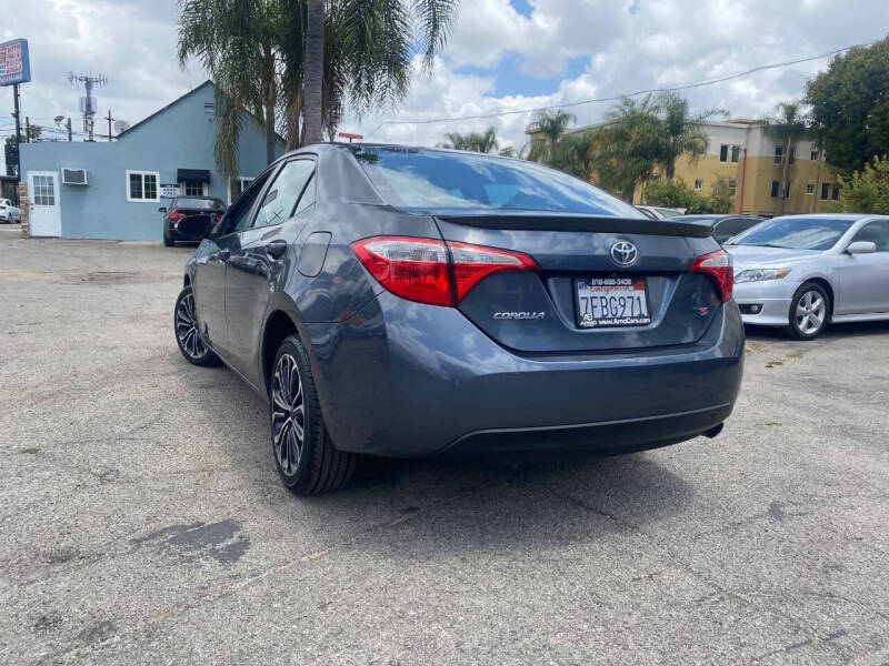toyota corolla 2014 5YFBURHE7EP110624 image toyota corolla 2014 5YFBURHE7EP110624 image
