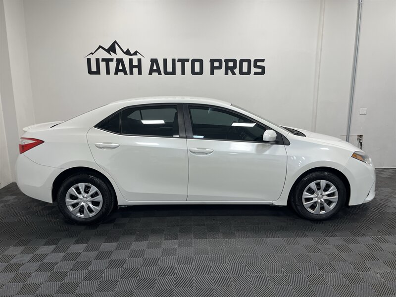 toyota corolla 2015 5YFBPRHE2FP242070 image toyota corolla 2015 5YFBPRHE2FP242070 image