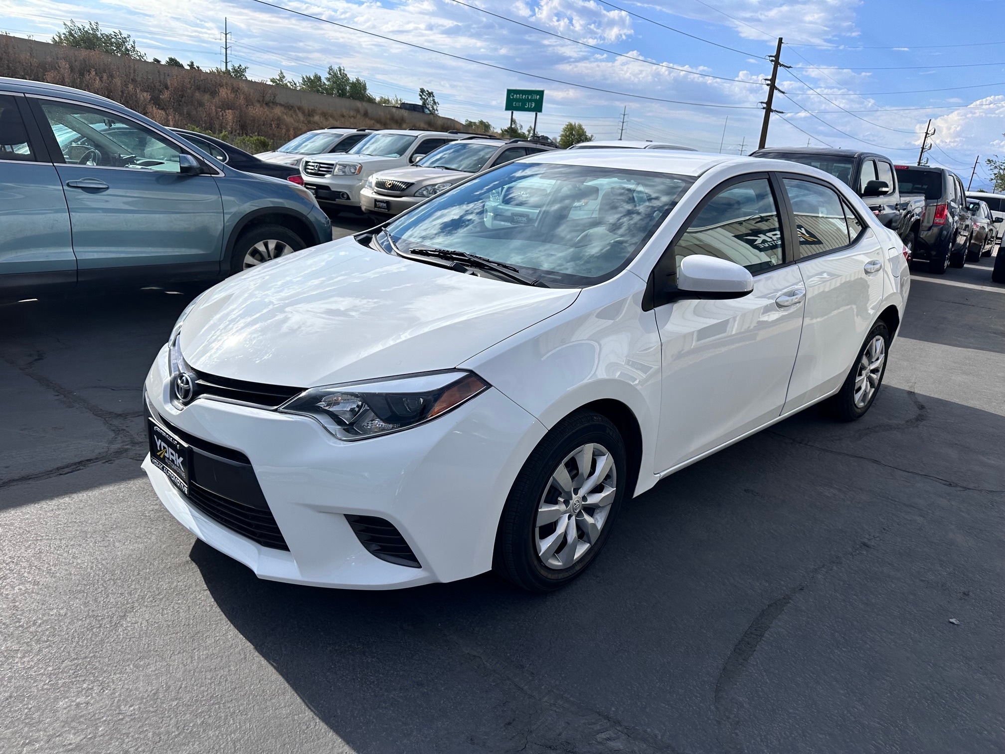 toyota corolla 2015 5YFBURHE1FP226063 image toyota corolla 2015 5YFBURHE1FP226063 image