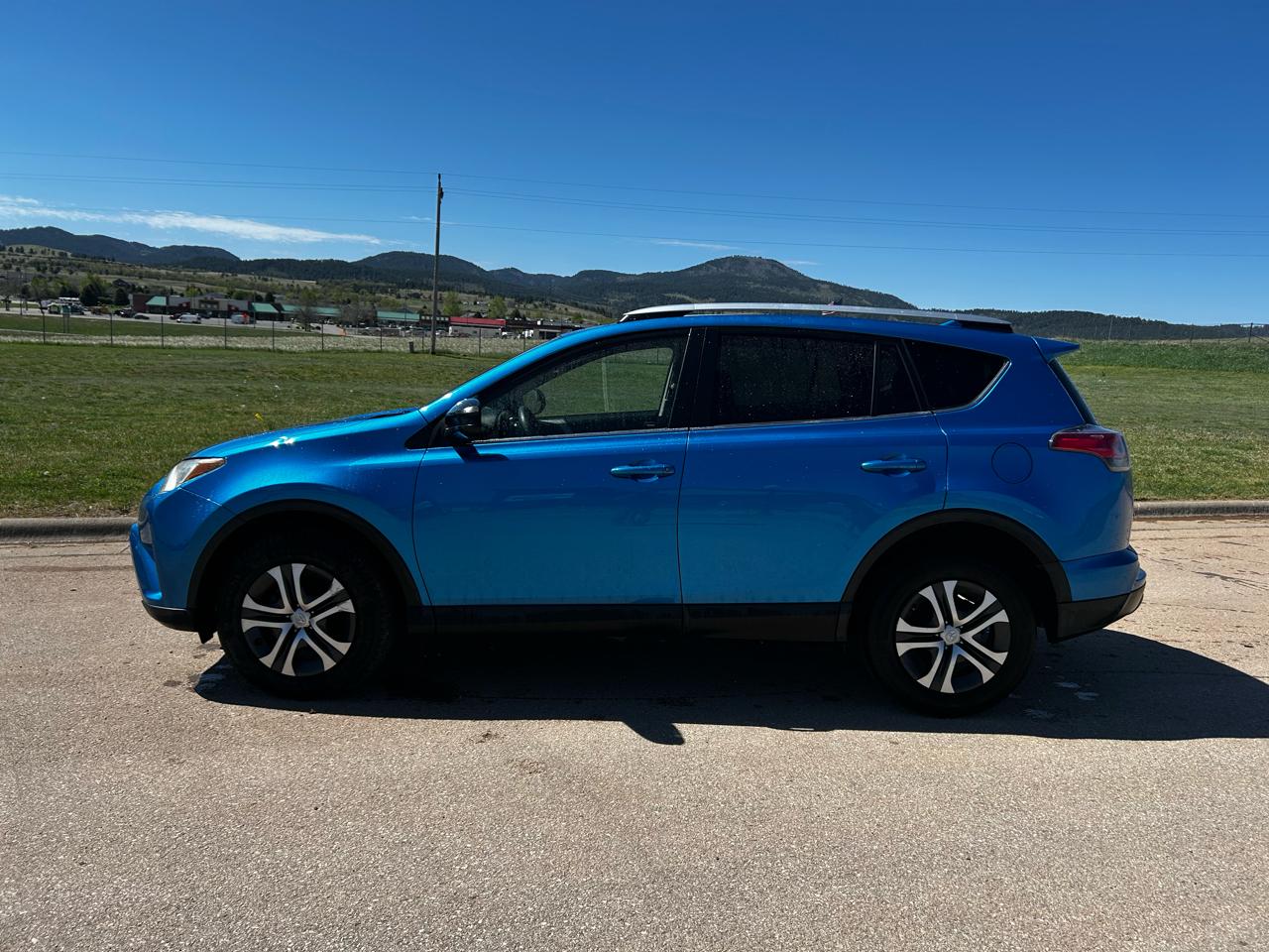 toyota rav4 2016 JTMBFREV1GJ104050 image toyota rav4 2016 JTMBFREV1GJ104050 image