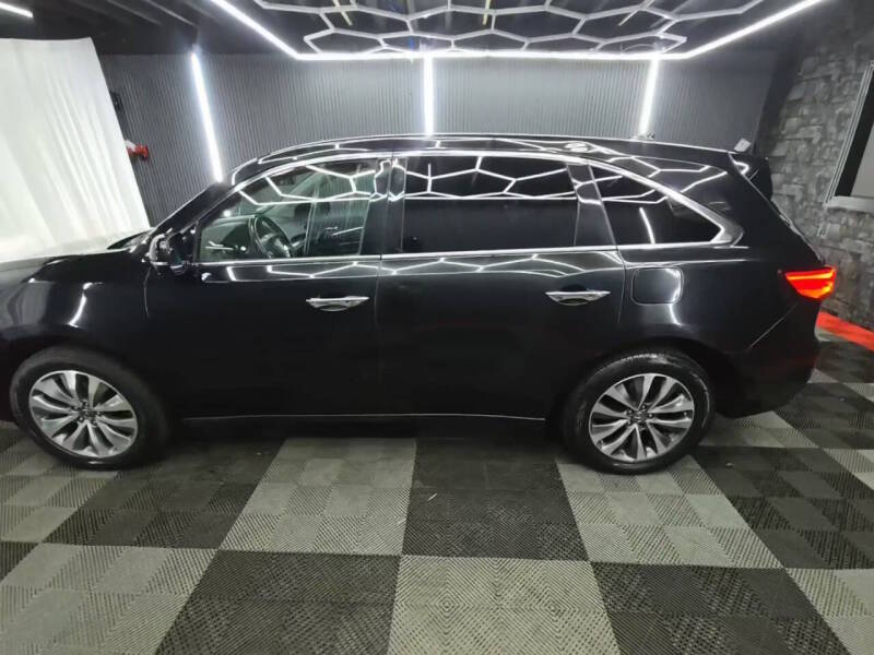 acura mdx 2016 5FRYD4H41GB006390 image acura mdx 2016 5FRYD4H41GB006390 image