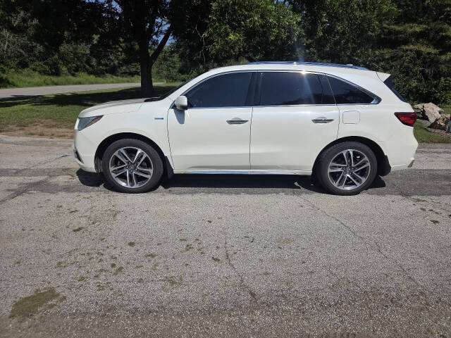 acura mdx 2017 5FRYD7H71HB000957 image acura mdx 2017 5FRYD7H71HB000957 image
