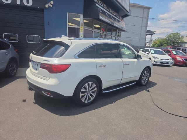 acura mdx 2014 5FRYD4H8XEB047357 image acura mdx 2014 5FRYD4H8XEB047357 image