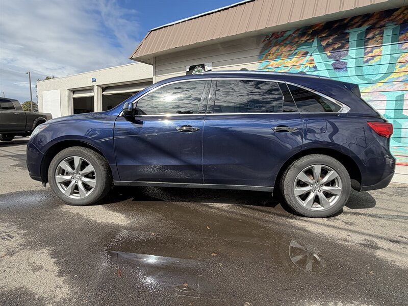acura mdx 2014 5FRYD4H82EB015762 image acura mdx 2014 5FRYD4H82EB015762 image