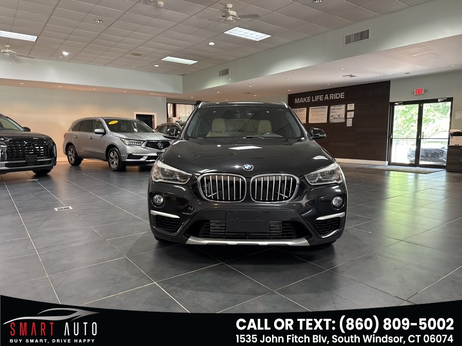 bmw x1 2016 WBXHT3Z38G4A50551 image bmw x1 2016 WBXHT3Z38G4A50551 image