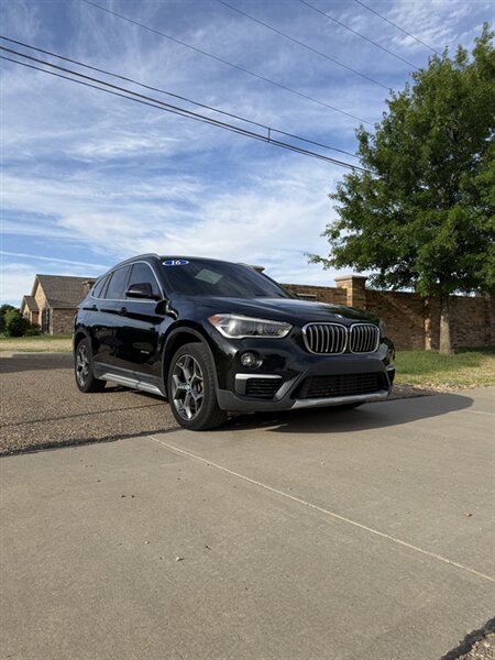 bmw x1 2016 WBXHT3C3XGP880582 image bmw x1 2016 WBXHT3C3XGP880582 image