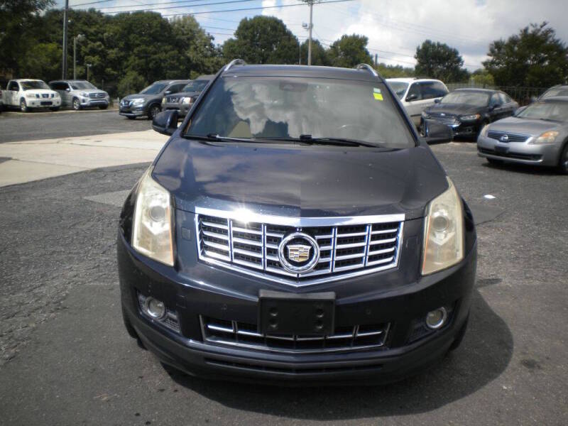 cadillac srx 2014 3GYFNFE31ES582931 image cadillac srx 2014 3GYFNFE31ES582931 image