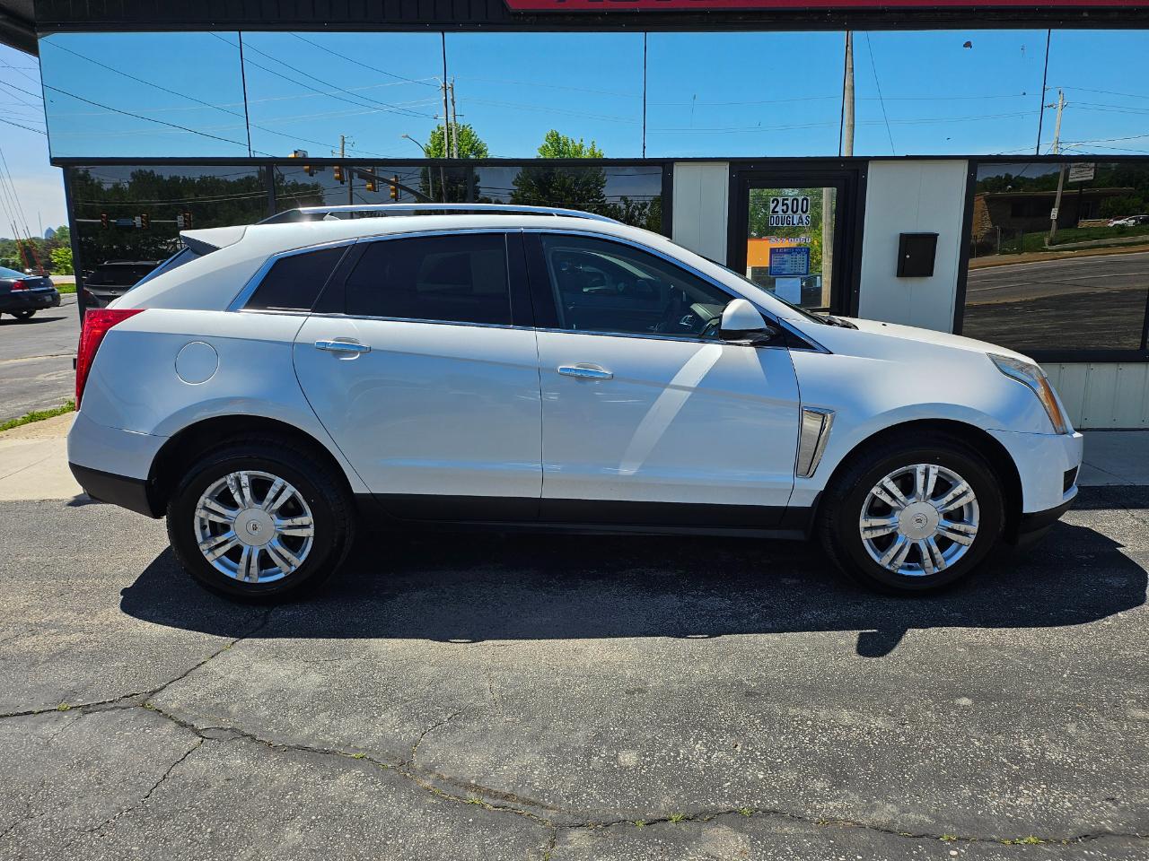 cadillac srx 2015 3GYFNEE36FS589045 image cadillac srx 2015 3GYFNEE36FS589045 image