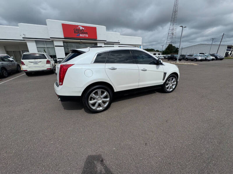 cadillac srx 2015 3GYFNEE30FS581085 image cadillac srx 2015 3GYFNEE30FS581085 image