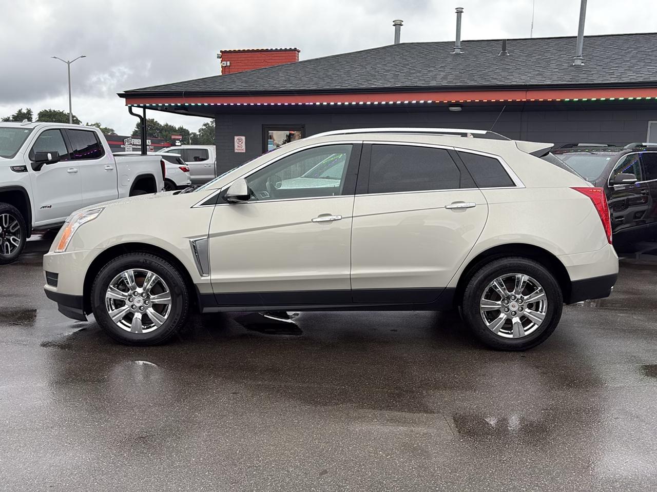 cadillac srx 2015 3GYFNBE34FS640797 image