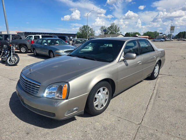 cadillac deville 2004 1G6KD54Y84U104554 image cadillac deville 2004 1G6KD54Y84U104554 image